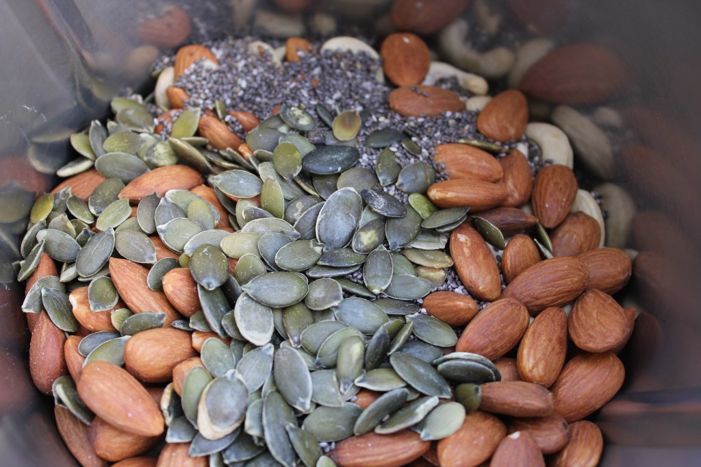 Nuts and seeds almonds chia raw cashews sesame chocolate slice wholefoods